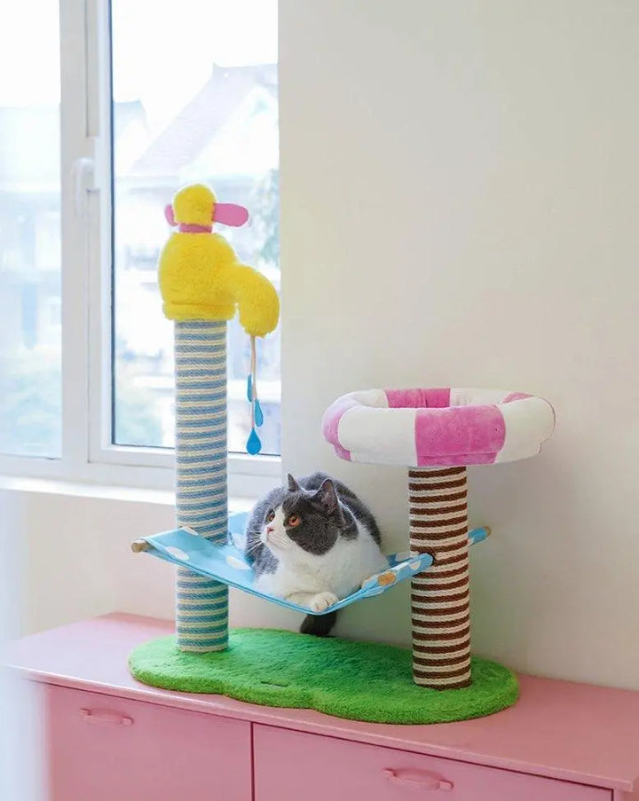 Spacious cat climbing frame with scratching post, jumping platform, and cozy bed