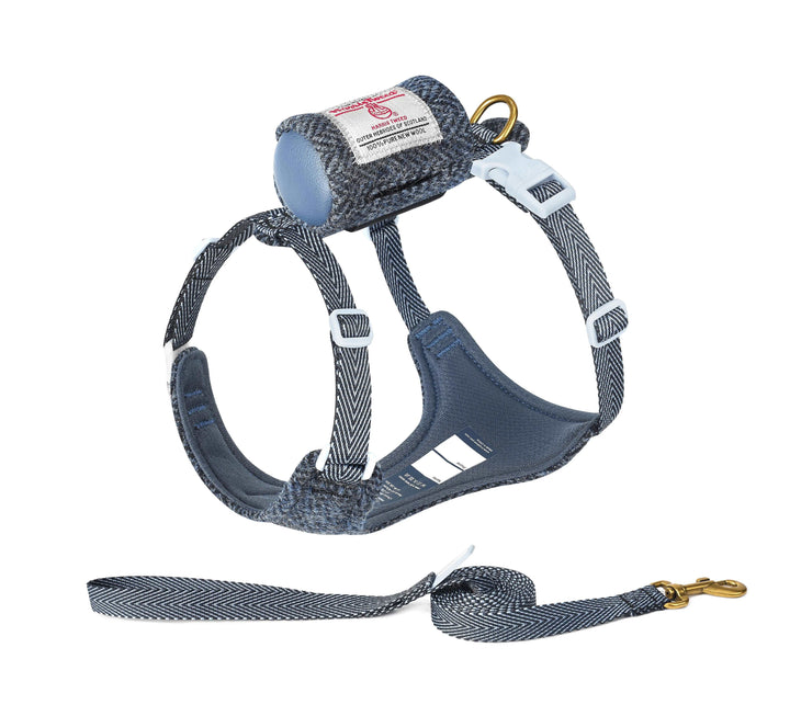 Stylish and durable dog harness and leash set made from high-quality Harris Tweed fabric, featuring adjustable straps, reflective strips for nighttime visibility, and a matching leash with a sturdy metal clasp. Suitable for dogs of various sizes, providing comfort and safety during daily walks and outdoor activities.