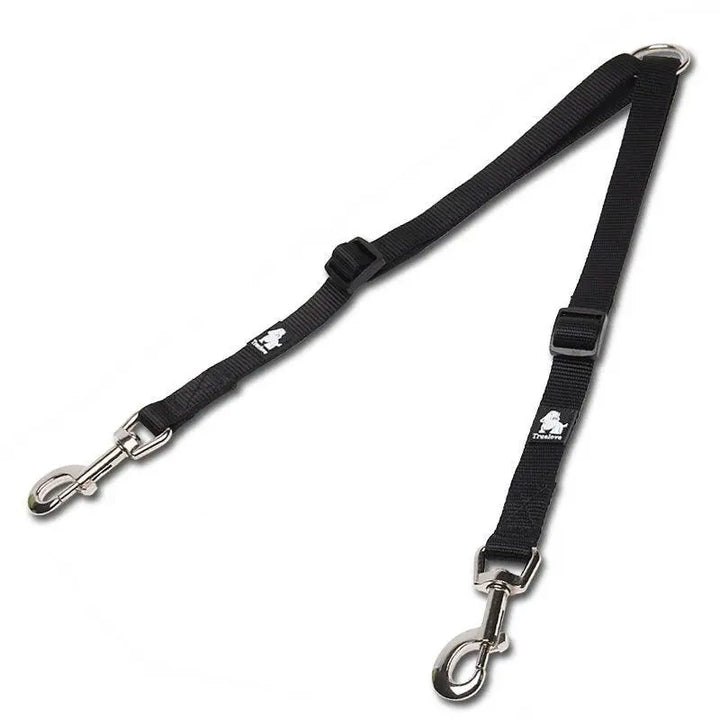 An image of a double dog leash with a tangle-free swivel mechanism. The leash features a soft, ergonomic foam handle and adjustable nylon straps in vibrant colors. Two sections of the leash branch out to allow walking two dogs simultaneously without tangling. Reflective stitching is visible for added safety in low-light conditions.