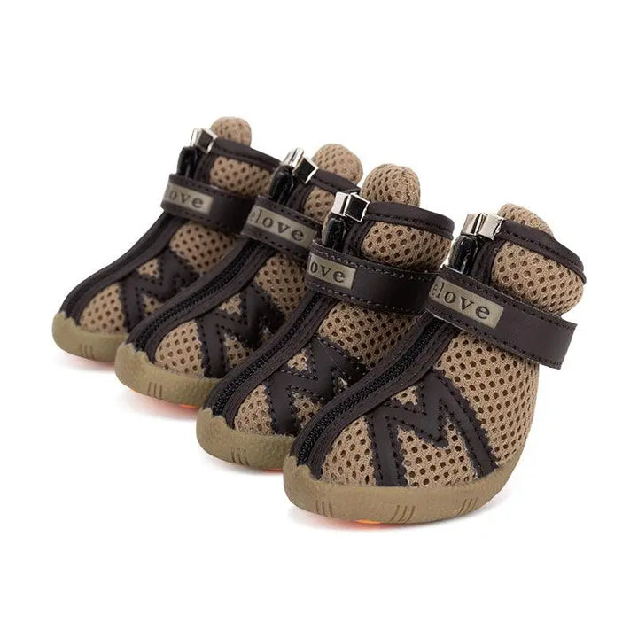 "Durable and stylish dog shoes in various colors, designed with breathable mesh and non-slip soles, perfect for protecting dogs' paws during outdoor activities."