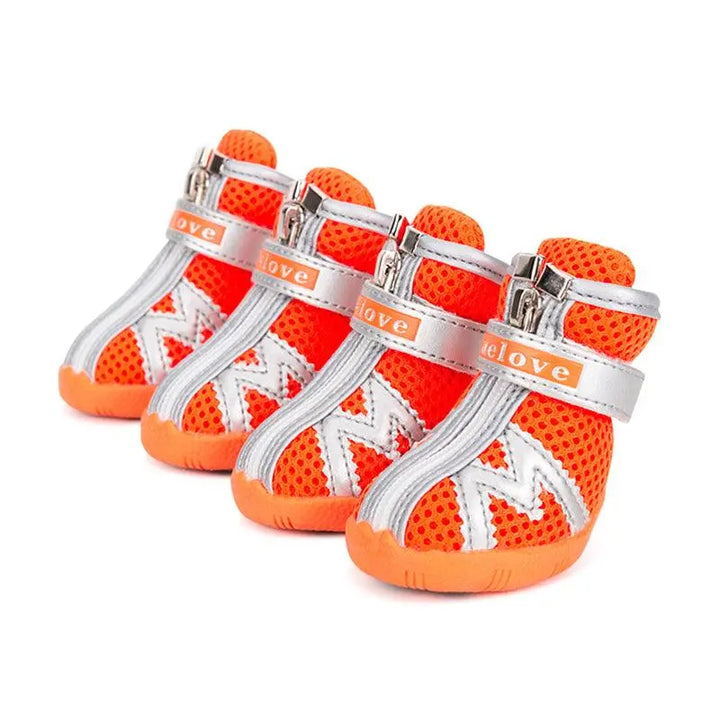 "Durable and stylish dog shoes in various colors, designed with breathable mesh and non-slip soles, perfect for protecting dogs' paws during outdoor activities."