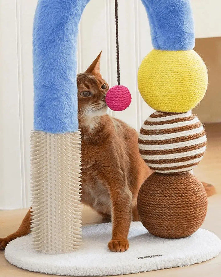 Geometric multi-functional cat scratching post showcasing a modern, minimalist design. The post is made of soft plush fabric and durable jute rope, with a thickened, stable base and a pink ball containing a rattle for playful interaction. Standing 70cm tall, the scratching post features a rounded arch shape, designed to meet cats' scratching and playing needs while blending seamlessly into home decor with both functionality and style.