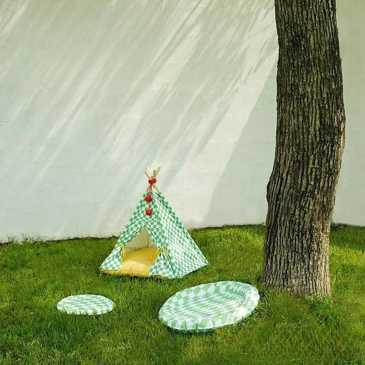 Cozy Cat Tent with green checkered design, providing a stylish lounging space for cats.