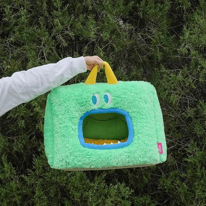 Green Wawa Monster Pet Bed with soft plush and spacious interior for cats.