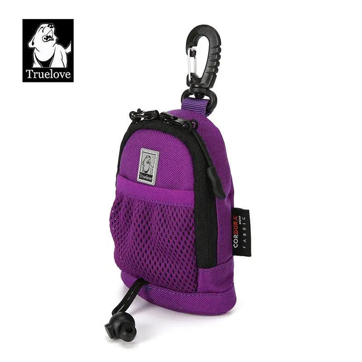 A compact and stylish multi-functional poop bag holder made of durable DuPont Cordura fabric, featuring a high-quality SBS zipper, quick-release hook, and mesh pocket for storage. Available in five vibrant colors: Baltic, Purple, Olive, Orangeade, and Black. The holder includes an external hook for used poop bags and hook-and-loop fasteners for versatile attachment to leashes, belts, or bags. Perfect for outdoor pet activities.