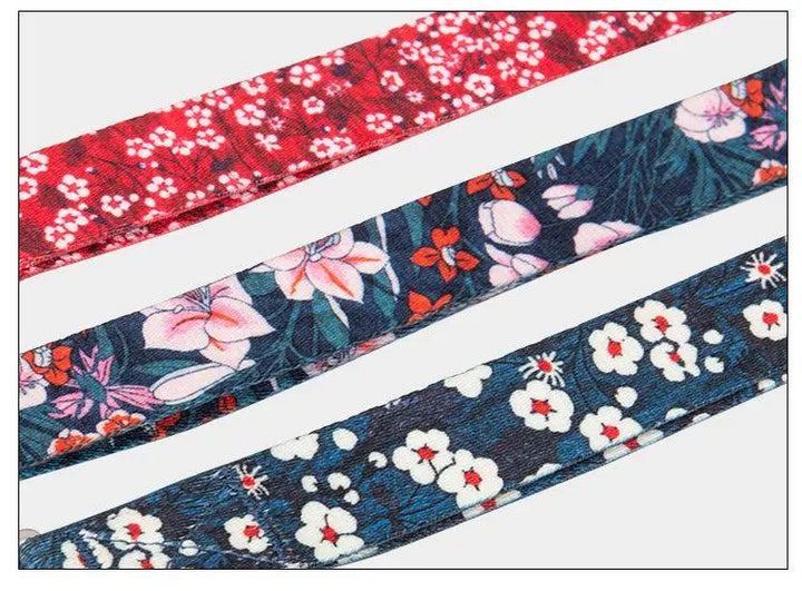 Multi-Handle Dog Leash in floral pattern displayed on a flat surface.