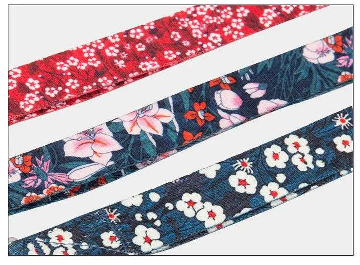 Multi-Handle Dog Leash in floral pattern displayed on a flat surface.