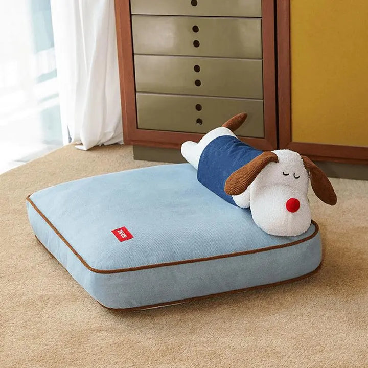 Cozy denim pet bed with a detachable puppy-shaped pillow, featuring a spacious design suitable for both dogs and cats. Made of soft-touch fabric, durable denim, and plush filling for comfort and support.