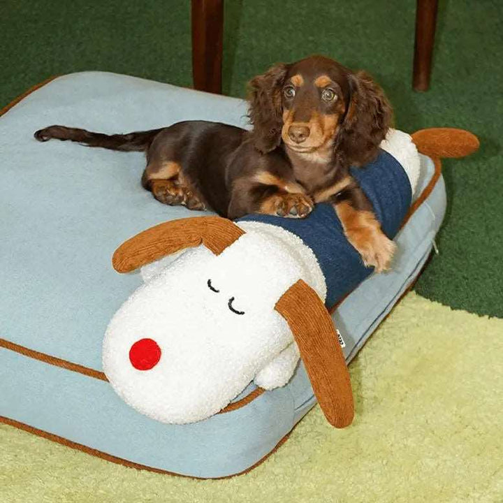 Cozy denim pet bed with a detachable puppy-shaped pillow, featuring a spacious design suitable for both dogs and cats. Made of soft-touch fabric, durable denim, and plush filling for comfort and support.