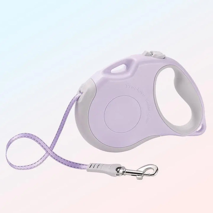 Retractable dog leash with durable build, ergonomic handle, and extra shoulder strap for hands-free control.