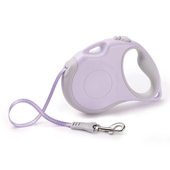 Retractable dog leash with durable build, ergonomic handle, and extra shoulder strap for hands-free control.