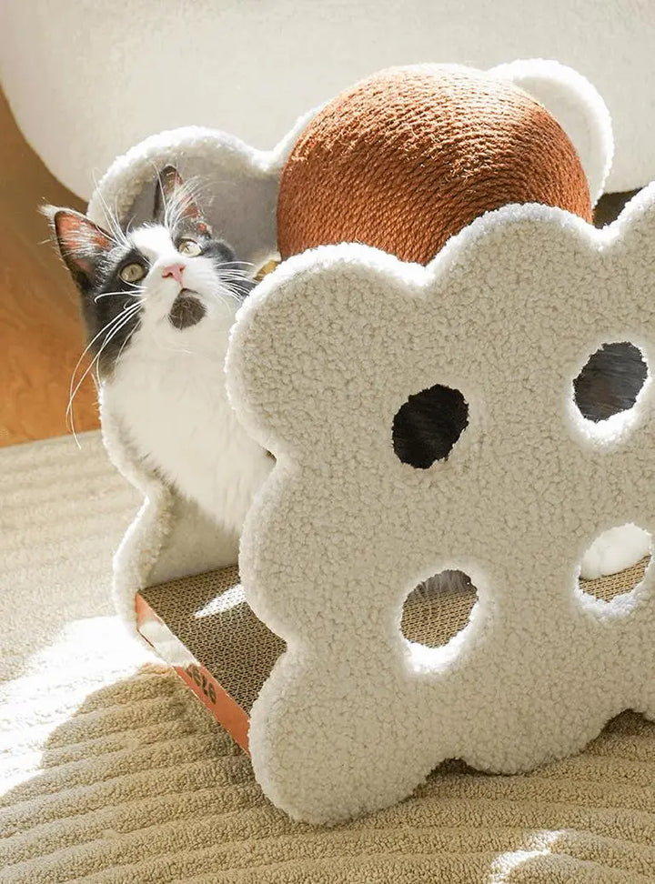 Sandwich Biscuit-shaped cat scratching ball made of plush fabric, hemp rope, and corrugated paper, in caramel and off-white.