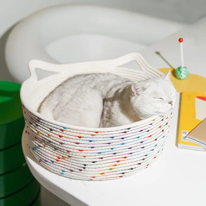 Spacious and comfortable handwoven pet basket with dual handles for portability and easy cleaning.