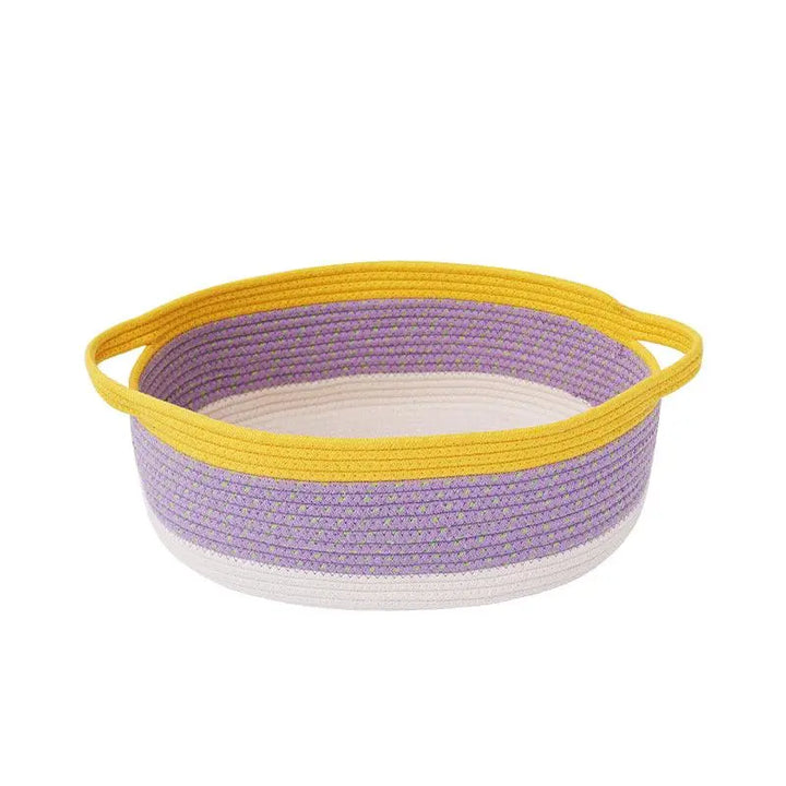 Spacious and comfortable handwoven pet basket with dual handles for portability and easy cleaning.