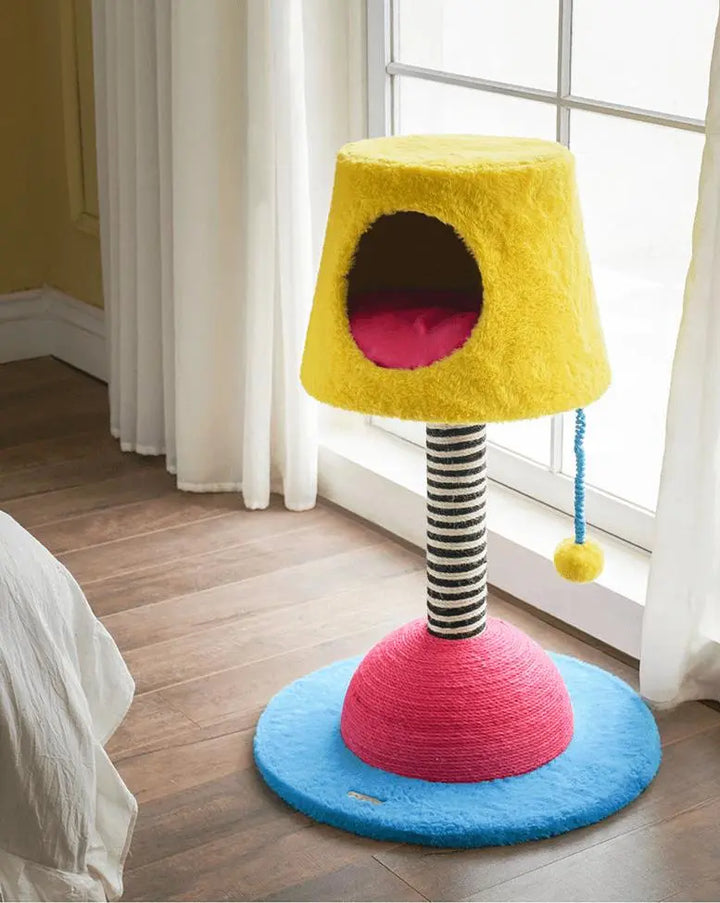 Stylish table lamp-shaped cat condo with scratching post, colorful pendant, and sturdy base, suitable for any home decor.