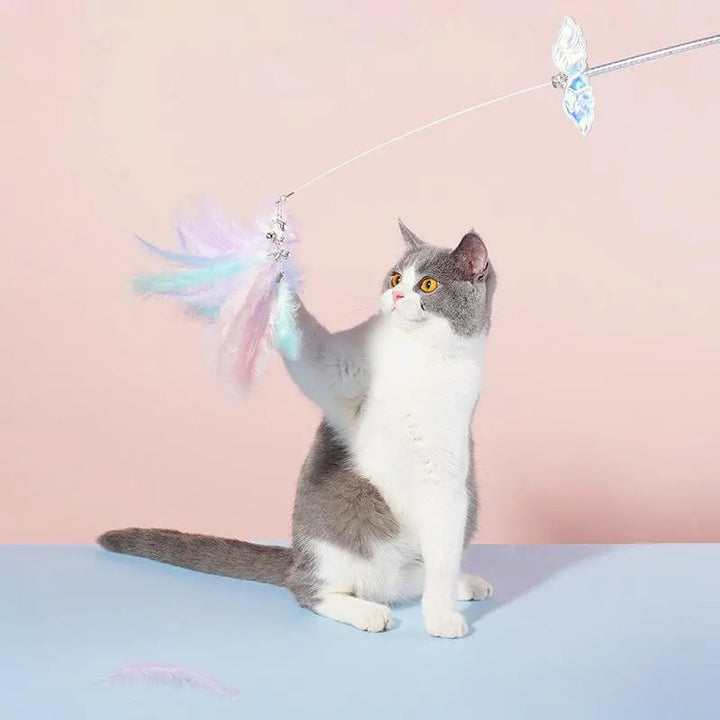 Unicorn fairy cat wand toy with pastel feathers and bell for interactive play