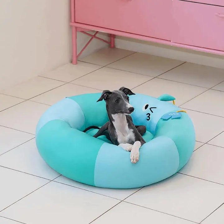 Cooling pet bed designed like a pool float, with spacious and soft structure, offering a refreshing summer vibe for pets.